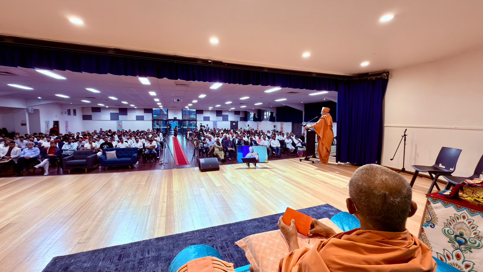 Members of the Australian community gathered for a spiritual assembly