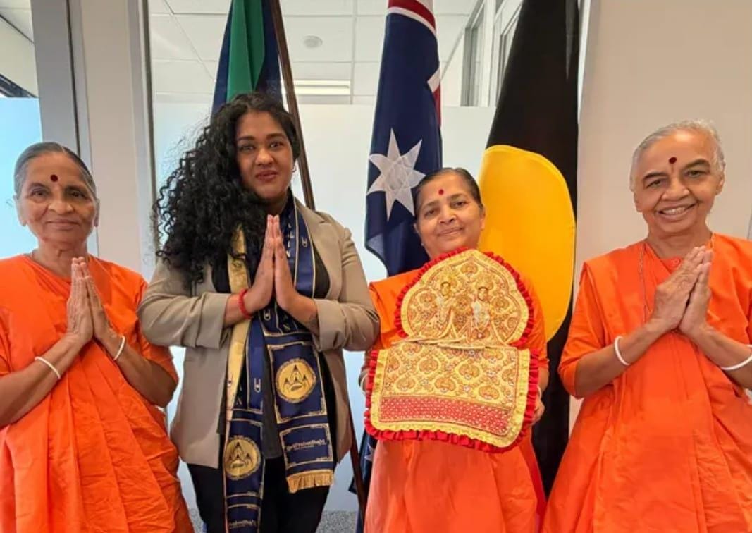 Women from the Australian community standing together